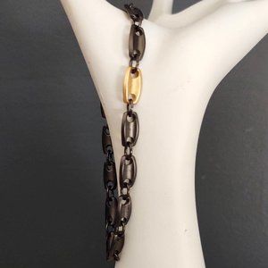 Dark bronze link bracelet with gold accent link